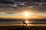 Dee Why Longboarder watching the Sunrise